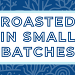 Text 'Roasted in Small Batches' on a white background, surrounded by a soft blue frame and a subtle ocean blue coral-themed backdrop, highlighting the artisan and small-batch roasting process for specialty coffee