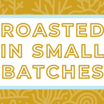 Text 'Roasted in Small Batches' on a white background, surrounded by a soft blue frame and a subtle honey yellow coral-themed backdrop, highlighting the artisan and small-batch roasting process for specialty coffee