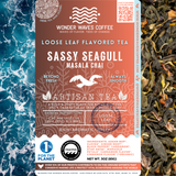 Sassy Seagull Masala Chai packaging featuring a rich, aromatic, and spiced flavor profile. Includes icons for loose leaf and artisan tea, along with detailed brewing instructions. The coral-toned ocean design showcases a flying seagull graphic and is accented by sustainability logos from 1% for the Planet and CleanHub.