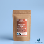 Sassy Seagull Masala Chai tea packaging with a rustic kraft pouch design, featuring a warm brown-orange ocean-themed label with a flying seagull illustration, flavor descriptors, and the ‘Artisan Tea’ label. Includes branding for Wonder Waves Coffee, highlighting its rich, aromatic profile and eco-friendly packaging.