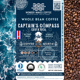 Captain’s Compass Costa Rica coffee packaging featuring a medium roast with bright acidity and medium body. Flavor notes include apple, orange, peach, chamomile, and chocolate. Sourced from the Alajuela region at 1,100 MASL. Includes icons for whole bean and eco-conscious packaging with a clean ocean design and sustainability logos for CleanHub, World Coffee Research, and 1% for the Planet. Marked as Coffee of the Month for May 2025.