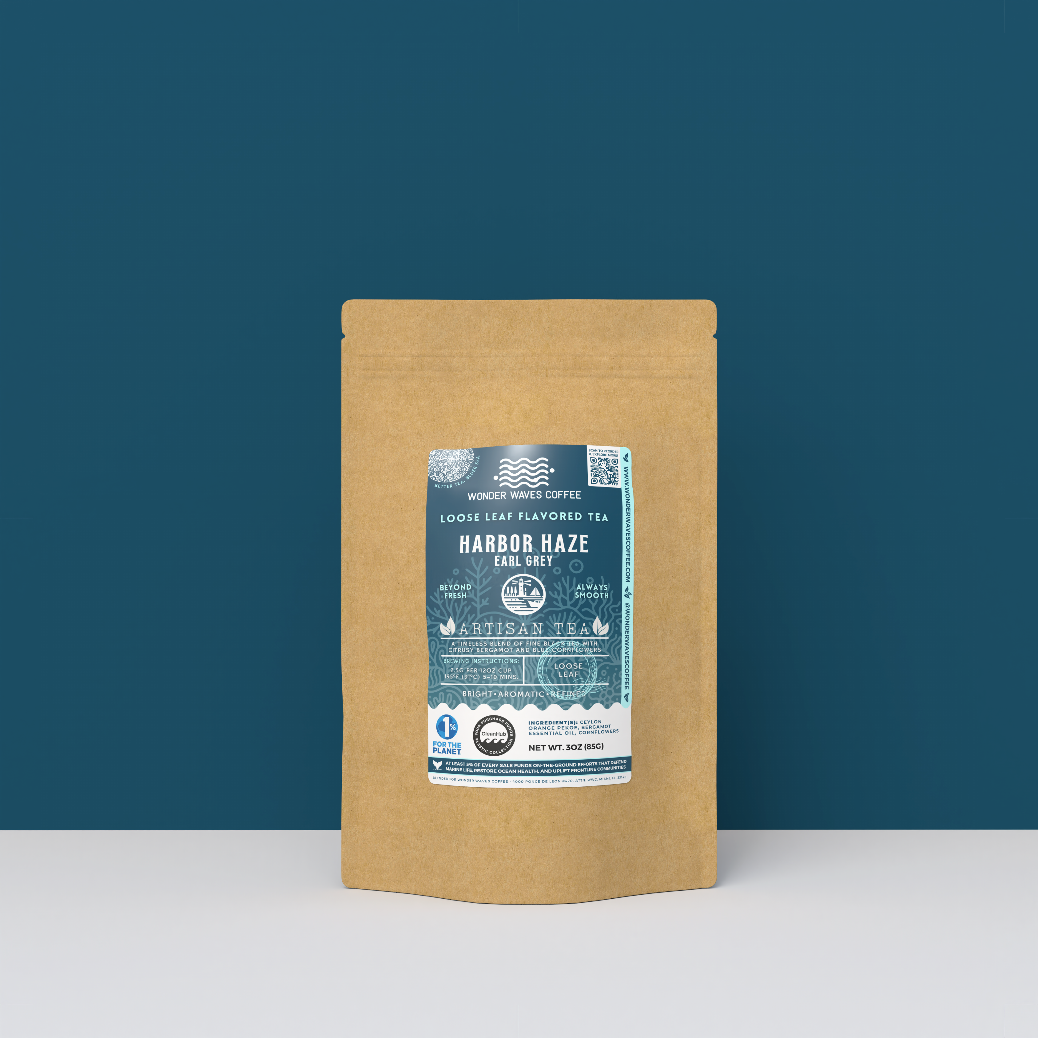 Harbor Haze Earl Grey black tea packaging with a rustic kraft pouch design, featuring a deep teal ocean-themed label with a lighthouse illustration, flavor descriptors, and the ‘Artisan Tea’ label. Includes branding for Wonder Waves Coffee, highlighting its bright, aromatic, and refined character and eco-conscious packaging.