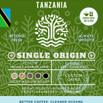 Mangrove Mist Tanzania Single Origin coffee packaging featuring a light-medium roast with bright acidity, rounded body, and tasting notes of fruity cranberry and lemon lime. Eco-conscious branding supporting cleaner oceans.