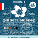 Bali Blue Indonesia Single Origin coffee packaging featuring a medium-dark roast with medium acidity and rich flavors of chocolate, orange peel, juniper, and molasses. Eco-conscious branding supporting cleaner oceans.