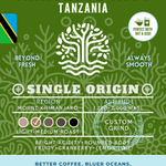 Mangrove Mist Tanzania Single Origin coffee packaging featuring a light-medium roast with bright acidity, rounded body, and tasting notes of fruity cranberry and lemon lime. Eco-conscious branding supporting cleaner oceans.