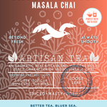 Sassy Seagull Masala Chai tea packaging featuring a spiced, malty, and bold black tea blend with traditional Indian spices. This loose leaf flavored tea label showcases a flying seagull illustration over warm ocean tones and promotes eco-conscious values and ocean preservation. Perfect for enjoying both hot and iced.
