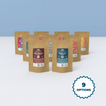Collection of Wonder Waves Coffee artisan loose leaf tea everyday gifting bags featuring assorted black, green, and herbal blends in eco-friendly kraft packaging for corporate and group gifts