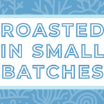 Text 'Roasted in Small Batches' on a white background, surrounded by a soft blue frame and a subtle baby blue coral-themed backdrop, highlighting the artisan and small-batch roasting process for specialty coffee