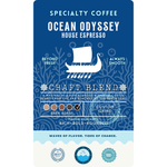 The product label for Wonder Waves Coffee Ocean Odyssey House Espresso. A deep blue sea-themed design featuring a Viking longship. It is identified as a masterful dark roast craft blend with flavor highlights of rich, bold, and rounded, sourced across the Seven Seas.