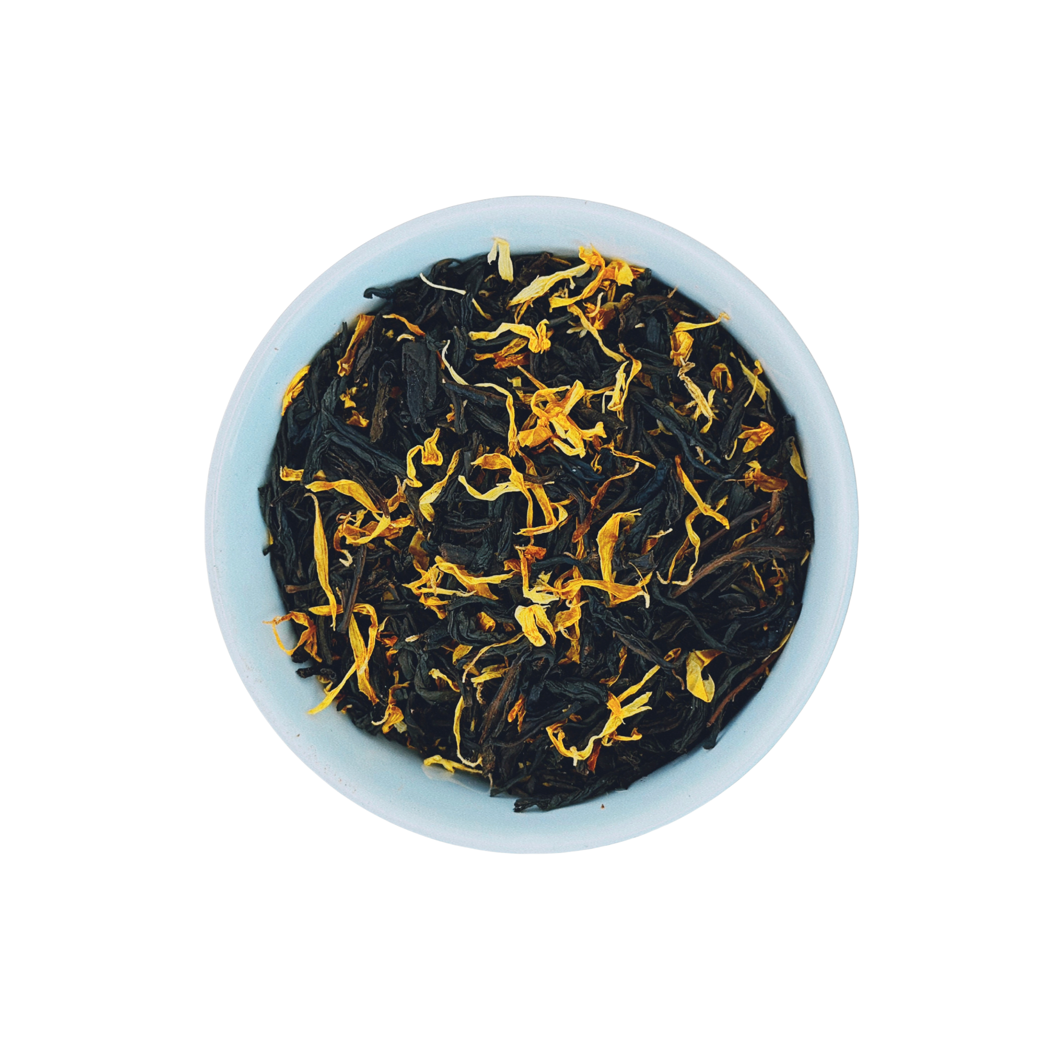 Tropical Tides Mango Ceylon loose leaf black tea in white bowl close-up by Wonder Waves Coffee featuring sweet tropical mango flavor and smooth body