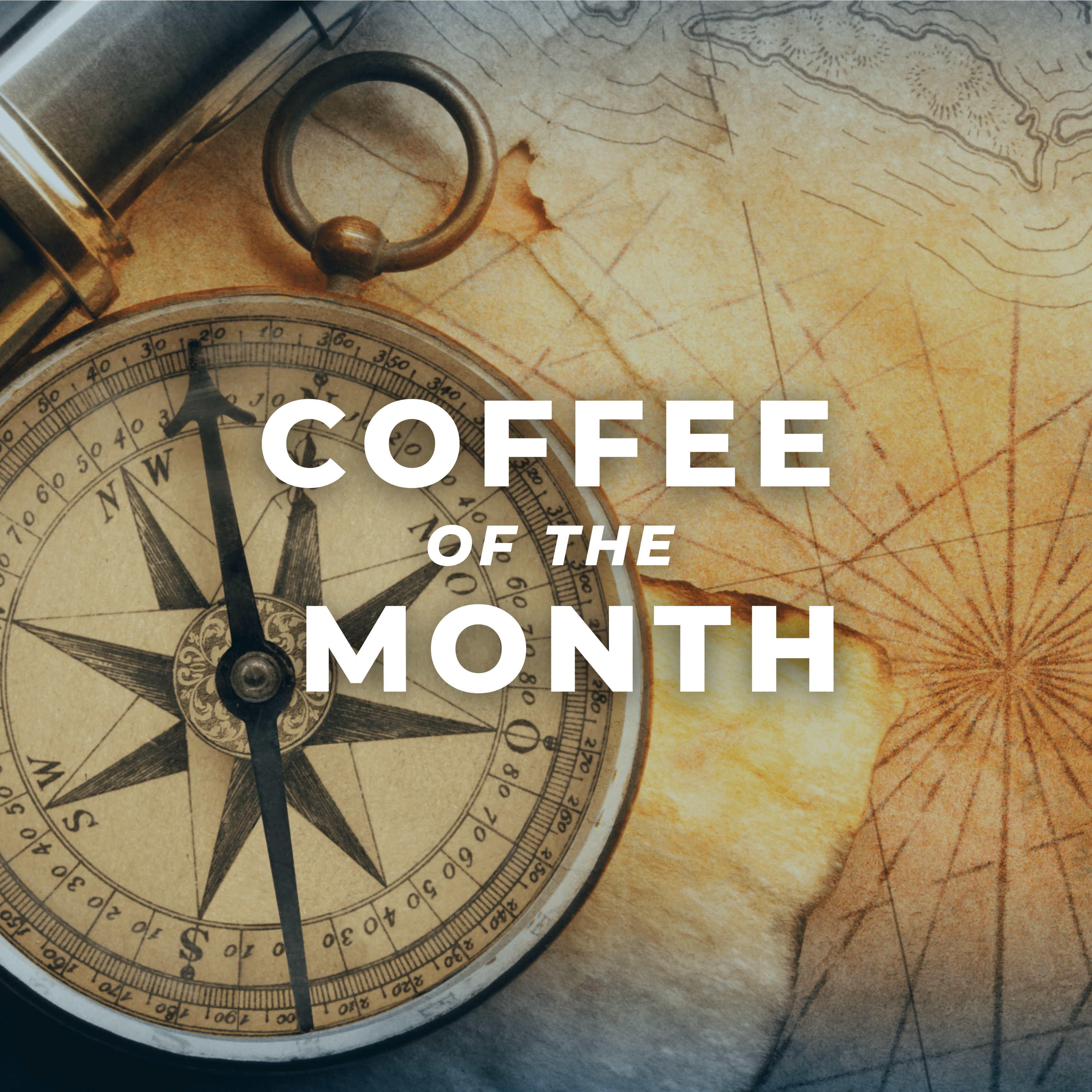 Vintage compass resting on an aged nautical map with Wonder Waves Coffee of the Month subscription text overlay