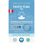 Detailed product label for Wonder Waves Coffee Pacific Pearl Peru specialty coffee. The label indicates a medium roast with tasting notes of herbal, lemon, and chocolate. It includes the Peru flag, an altitude range of 1,500 to 1,800 MASL, and a 100% satisfaction guarantee seal.
