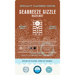 Product label for Wonder Waves Coffee Seabreeze Sizzle Hazelnut specialty flavored coffee, a warm and aromatic medium roast blend with toasty sweetness and nutty, balanced flavor highlights.