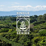 Promotional graphic for the Wonder Waves Single Origin Series. A white logo featuring a coffee bean and plant icon is centered over a lush, high-altitude coffee farm in the mountains of Peru. The text "SINGLE ORIGIN SERIES" is displayed against a bright, sunny blue sky and rolling green hills.