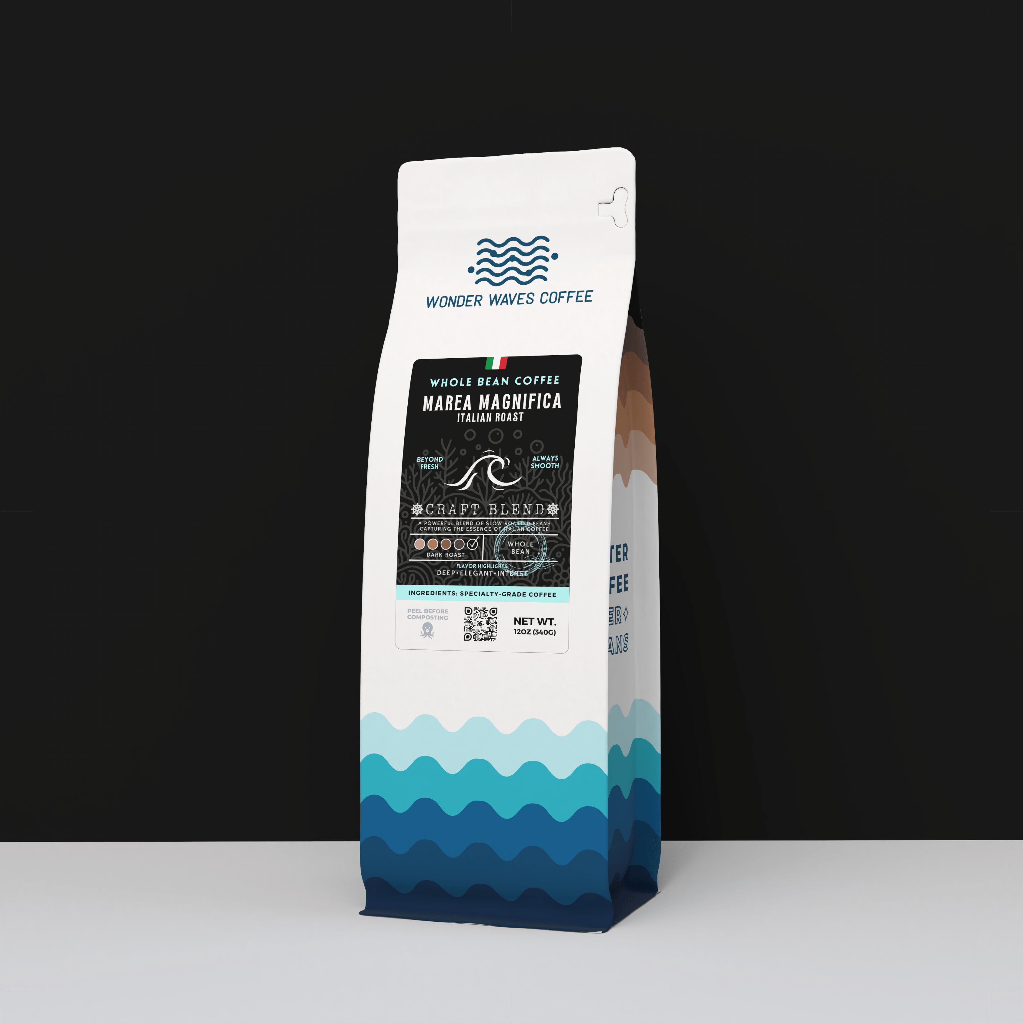 A 12oz bag of Wonder Waves Marea Magnifica Italian Roast. The white bag features a dark blue wave pattern and a black label with a white wave icon and the Italian flag. Set against a minimalist black and white background, the label highlights a deep, elegant, and intense flavor profile.